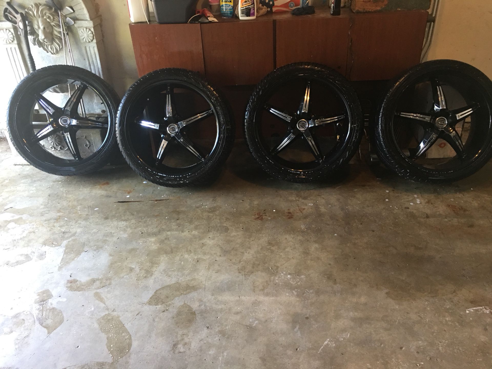 22’’ Rims Black and chrome. Tires and Rims together. buy or trade for smaller size tires and rims.