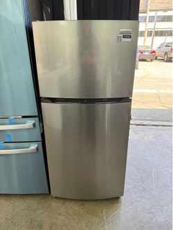 Brand new Frigidaire Stainless Steel top and bottom refrigerator