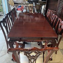 I AM SELLING THE REAL WOOD DINING 100% TABLE WITH 8 chairs . Very strong chairs and table CHERRY COLORS  Long table 80 inches   Wide 43 inches  Very g
