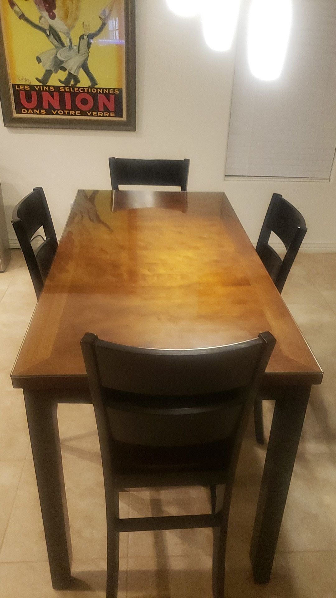 Dining table and 4 chairs and cushions