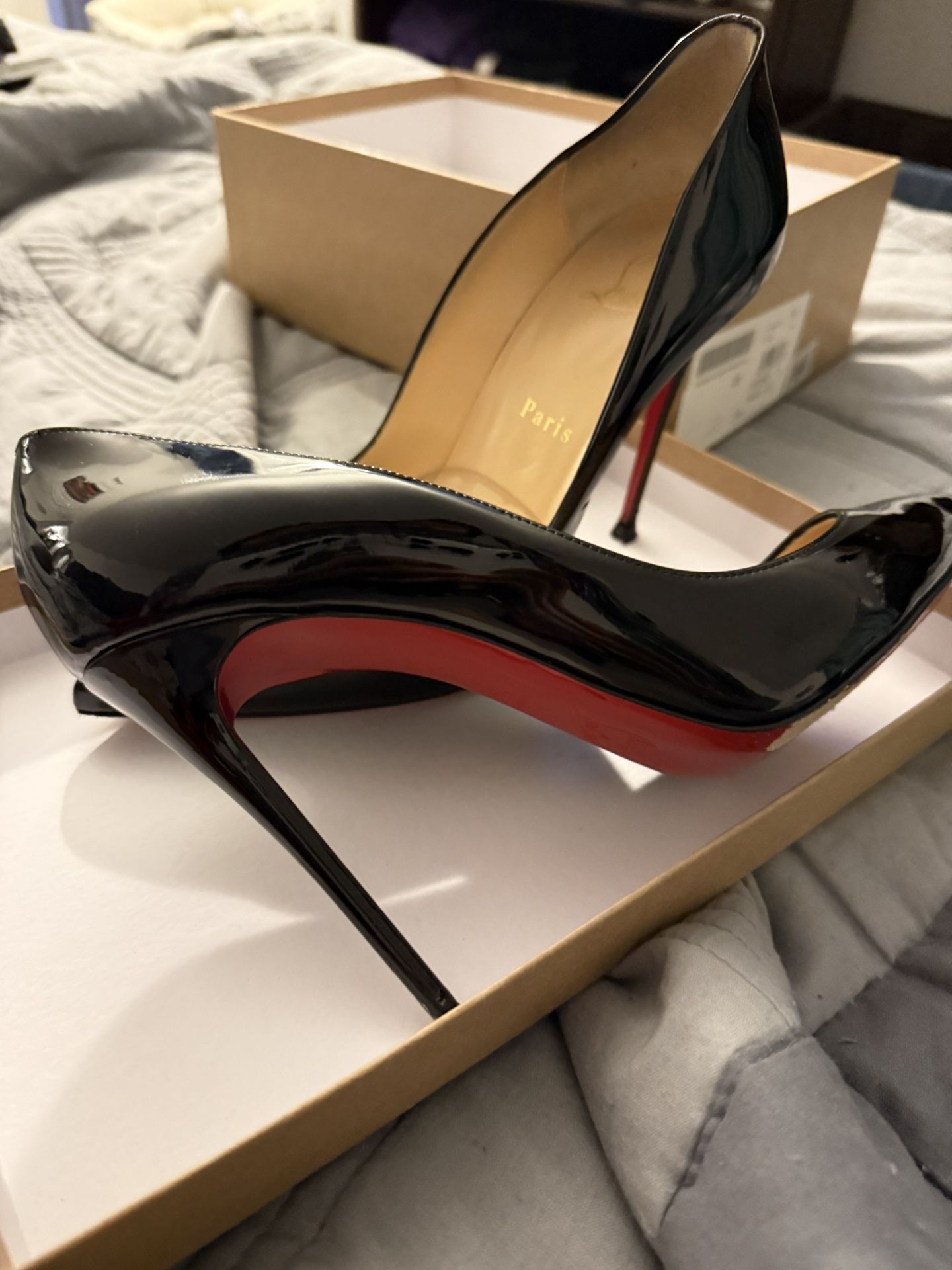 Christian Louboutin black pattern, leather pumps