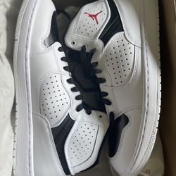 Air Jordan White and Black Mans Sneakers. New. Original price $190 size 10,5