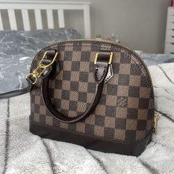 Louis Vuitton Alma Bag