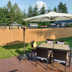 Outdoor Table, Chairs And Umbrella
