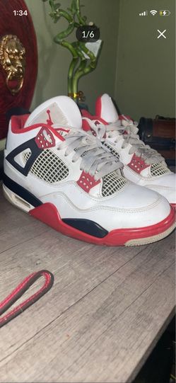 Fire red Jordan 4s Sz 8