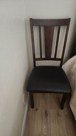 Chestnut dining chairs.