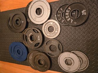 Used 2.5lb and 5lb Olympic Weight Plates