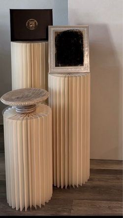 cardboard cylinder stand