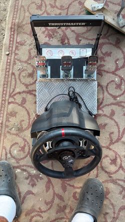 Gaming steering wheel and pedals by thrust master