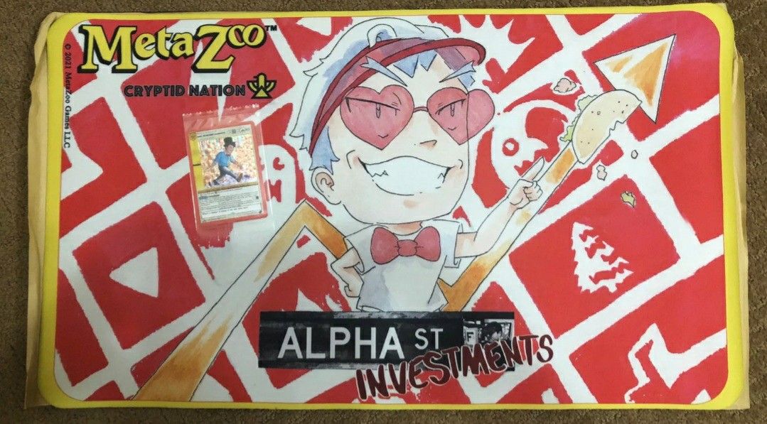 Metazoo Alpha Investments Playmat Cryptid Nation Release and Rudy Promo Card