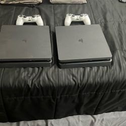 2 Perfect Condition PS4s Both With a White Controller
