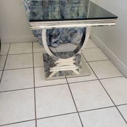 Stainless steel end table with black glass