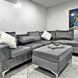 Grey Velvet Reversible Sectional With Cup Holder And Storage Ottoman. Brand New.