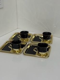 Vintage Mid Century Modern set of 4 Black Ceramic Cups with Golden Metal Base, with 4 Golden Metal Plates Lacquered in black