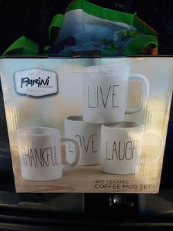 Set of 4 mugs by Parini ceramics. New in Box.