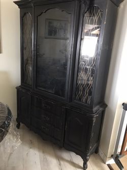 Collectible China cabinet with plate/photo stand shelves