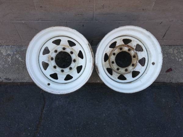 two 16.5x9.75 wagon wheel style steel 8 lug rims, Dodge, Chevy