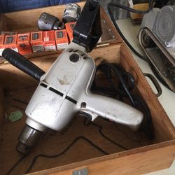 Reversing Drill with Hole Saw Bits