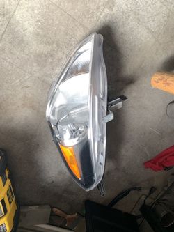 Nissan Versa left headlight
