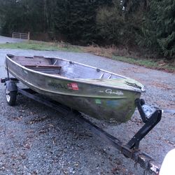 1966 Aluminum boat with trailer.