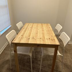 For Sale: Wooden Dining Table with 4 Chairs 