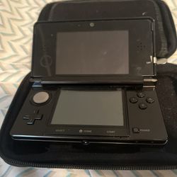 nintendo 3ds with charger and games 