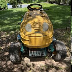 Yard Man Riding Lawnmower 