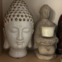 Zen Buddhas $25 & Up. Candle Holder $25. 2 Ceramic Buddha Heads $50. Green Statue $75. Antique Lamp & Tiffany Slag Glass Shade $200. 2 Tall Gray $160.