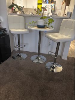 Bar set w/ two leather  white stools and table