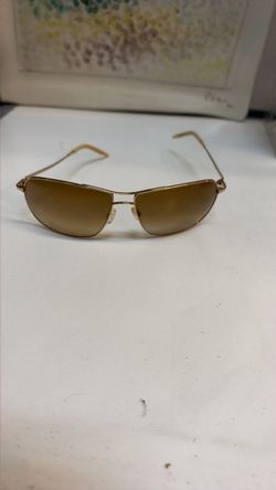 The selected item is a pair of Oliver Peoples Benedict sunglasses (specifically model OV 1002S). This classic design features a lightweight, double-br