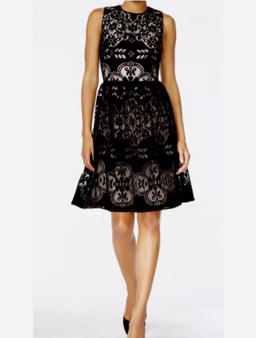 Brand new woman’s Tommy Hilfiger brand black lace mini dress up for sale 