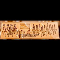 26 pieces- glam and blitz brushes with eyelash curler