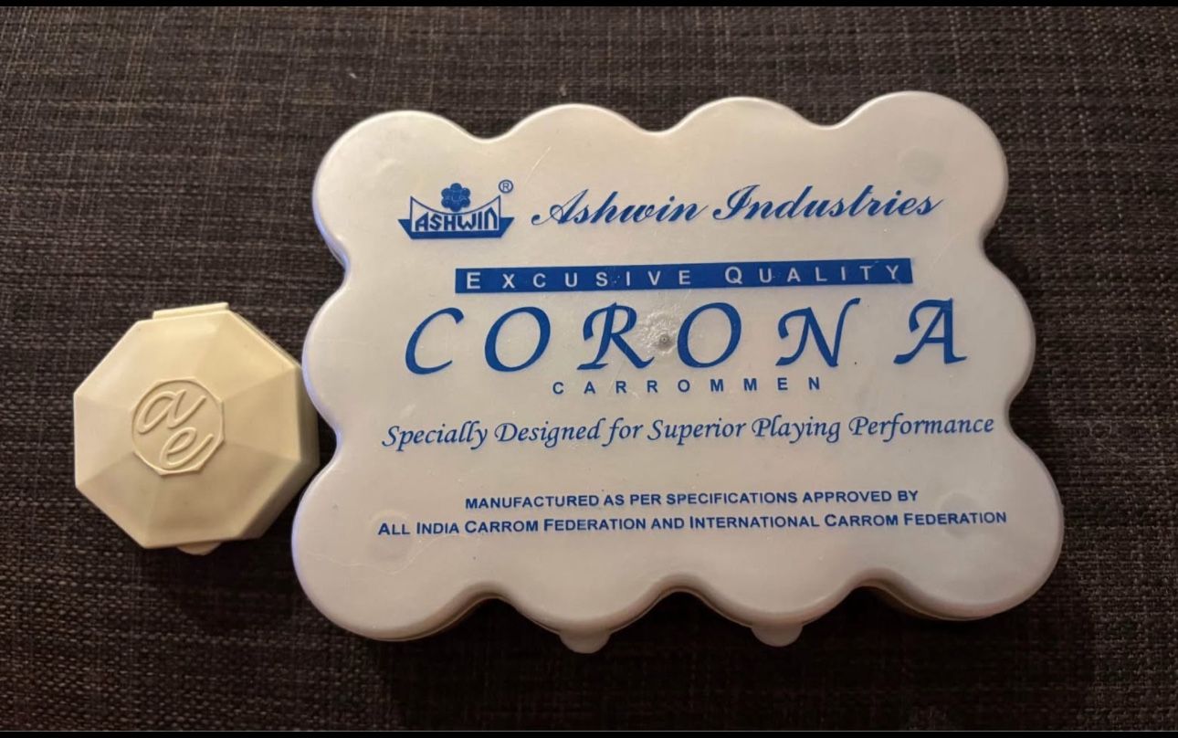 Carrom corona seeds and striker game
