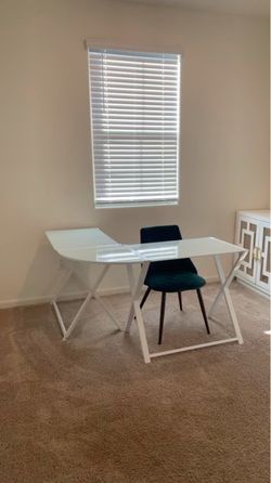 L- shaped glass desk