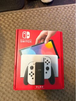 Nintendo Switch OLED + 2 games