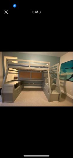 Twin bunk bed with desk attachment