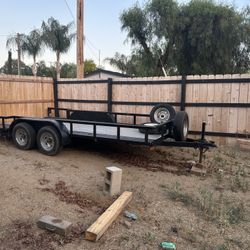 Aztec 16 by 6’4” flatbed trailer tandem axle great condition, great tires, spare and ramps