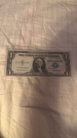 1935 $1  silver certificate blue seal with a star