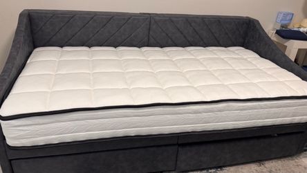 Full size semi-firm mattress.