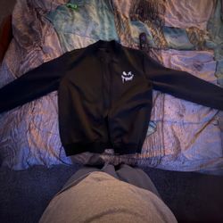 Full zip up hoodie with scary/cool face design