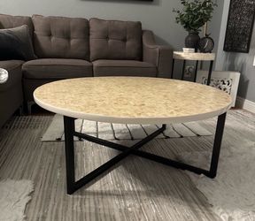 MOTHER OF PEARL WITH BLACK LEGS COFFE E TABLE
