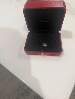 Cartier 18K Trinity Bracelet with black cord