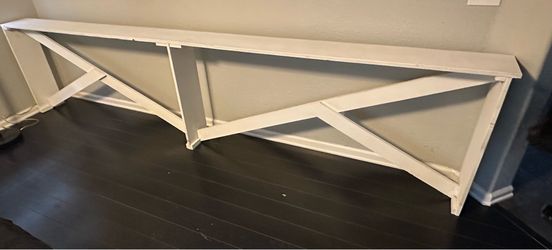 Behind couch table