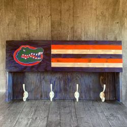 Gator hat/coat rack with concealment area
