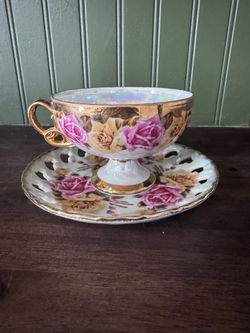 Vintage lusterware teacup and saucer