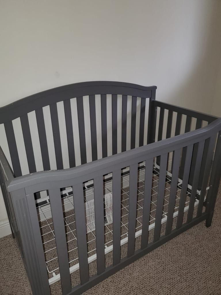Baby crib with Serta mattress and changing table/dresser