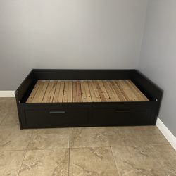 Twin bed with draws