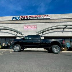 DUALLY WHEELS TIRES LEVELING & LIFT KITS SIDE STEPS BED COVERS AIR BAG KITS FOR TOWING Installations (WE FINANCE)