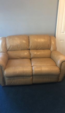 Dual reclining leather loveseat