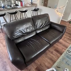 Two Natuzzi Leather Recliner Loveseats 